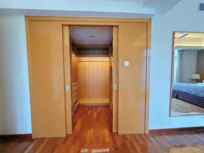 a room with a door leading to a bedroom at Lot163 By ZenGlo in Kuala Lumpur