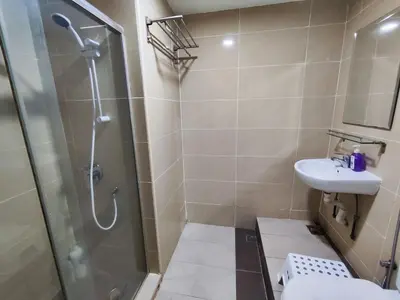 a bathroom with a shower and a toilet and a sink at Nice Stay 16pax at Wisma Cosway Pavilion KLCC Bukit Bintang in Kuala Lumpur