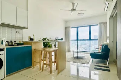 a kitchen with a blue chair and a kitchen with a window at Continew by Xuan and Partner near KLCC and Bukit Bintang in Kuala Lumpur