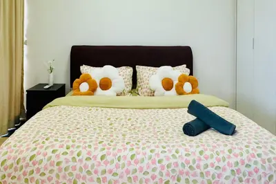 a group of stuffed animals sitting on a bed at Continew by Xuan and Partner near KLCC and Bukit Bintang in Kuala Lumpur