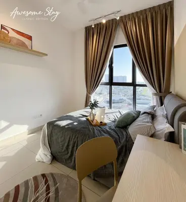 a bedroom with a bed and a large window at Trion @ KL By The Relaxstay in Kuala Lumpur