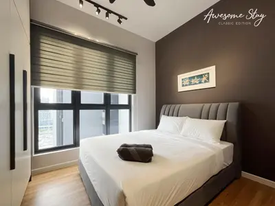 a bedroom with a large bed and a window at Sunway Velocity Two By Awesomestay in Kuala Lumpur
