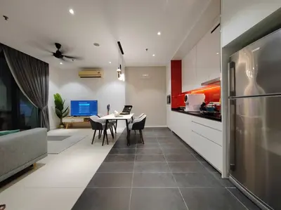 a kitchen and dining room with a table and a refrigerator at Arcoris Mont Kiara 7# Main Street #Walking 1MK# 163 Retails# 2 BR Balcony 2-4Pax in Kuala Lumpur