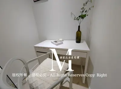 an right reviewers cozy right table and chair in a room at Arcoris Mont Kiara 23# 2 Bedroom Balcony #2-4pax in Kuala Lumpur