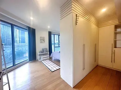 a large room with a room with a door to a bedroom at Bintang Fairlane Residence, KLCC & City Skyline View -2B1R in Kuala Lumpur