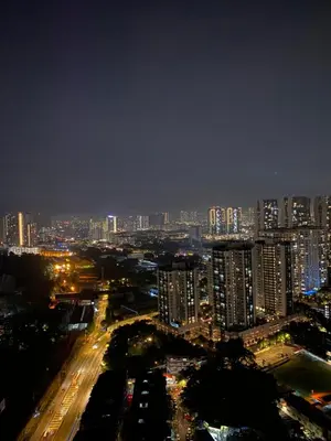 a view of a city at night with buildings at Infinite Pool! Room in Kuala Lumpur in Kuala Lumpur
