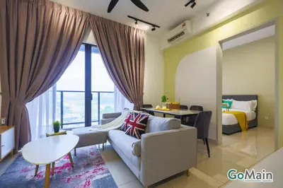 a living room with a couch and a bed at Free Parking - Big Suite Trion Kuala Lumpur by GoMain in Kuala Lumpur