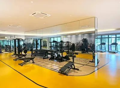 a gym with treadmills and cardio equipment in a building at MVD19#Family Suite 8pax 3 Rooms M Vertica Velocity Mall Cheras IKEA Mytown Short Walk to MRT & LRT Maluri in Kuala Lumpur