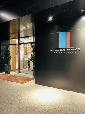 a building with a sign on the side of it at Imperial Luxury Suites KLCC by Moonway in Kuala Lumpur