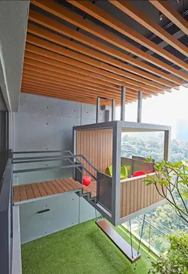 a room with a balcony with green grass at Stylish Ceylonz Suite near Bukit Bintang 4pax in Kuala Lumpur