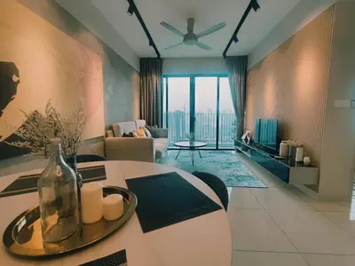 a living room with a couch and a table with candles at Datum Jelatek Residences Royalty Luxury Apartment, Walking Distance To LRT, Gleneagles KL & KLCC in Kampong Datok Keramat