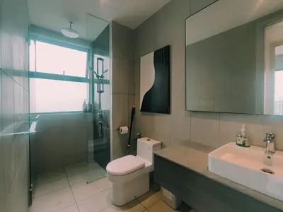 a bathroom with a toilet and a sink and a shower at Datum Jelatek Residences Royalty Luxury Apartment, Walking Distance To LRT, Gleneagles KL & KLCC in Kampong Datok Keramat