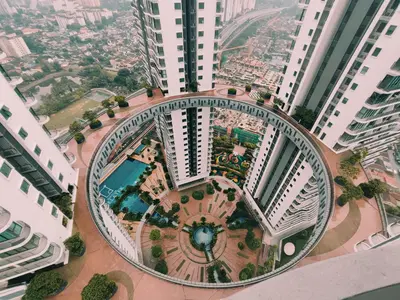an aerial view of a large building with a garden at Datum Jelatek Residences Royalty Luxury Apartment, Walking Distance To LRT, Gleneagles KL & KLCC in Kampong Datok Keramat