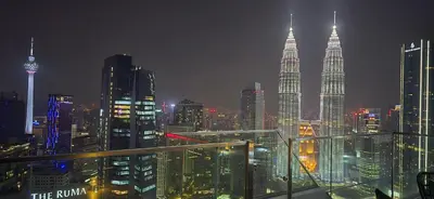 a view of the kuala lumpur city at night at Imperial Suites KLCC in Kuala Lumpur