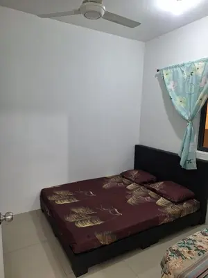 a bed in a room with a ceiling at vista sentul residence share apartment with host in Kuala Lumpur