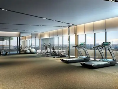 a gym with treadmills and machines in a room with windows at vista sentul residence share apartment with host in Kuala Lumpur