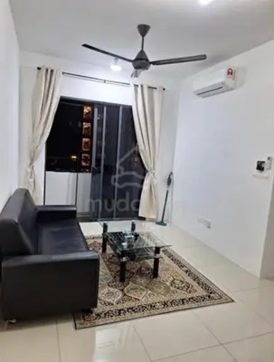 a living room with a black couch and a table at vista sentul residence share apartment with host in Kuala Lumpur