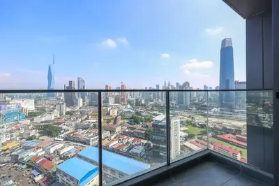 a view of a city from a balcony in a building at Continew TRX Corner House +2 Balconies +2 Rooms in Kuala Lumpur