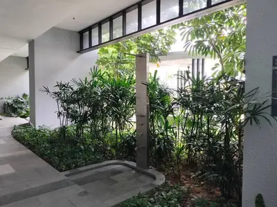 a courtyard with plants in a building at Conveniently Located Trion KL Premium Amenities in Kuala Lumpur