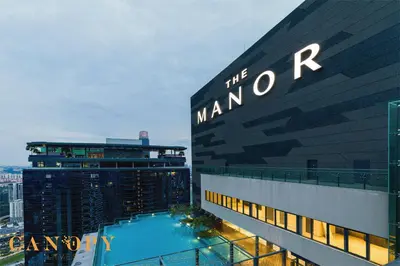a view of the manor hotel with a large building at The Manor Serviced Residence by Canopy Lives in Kuala Lumpur