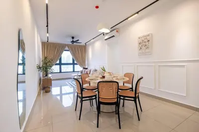 a dining room with a table and chairs at M Vertica KL City Tower C By Feel Home in Kuala Lumpur