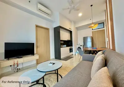 a living room with a couch and a flat screen tv at The Colony BEST SKY Pool View in Kuala Lumpur
