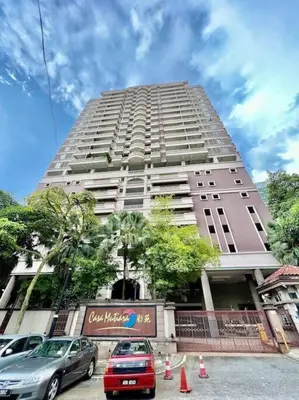 a tall building with cars parked in front of it at 19-16 Casa Mutiara-Sweet Home city view in Kuala Lumpur