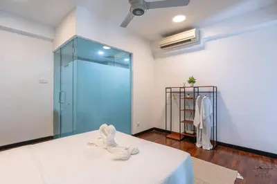 a room with a white table and a glass door at Scott Garden #23th KLCC view #MidValley Megamall in Kuala Lumpur