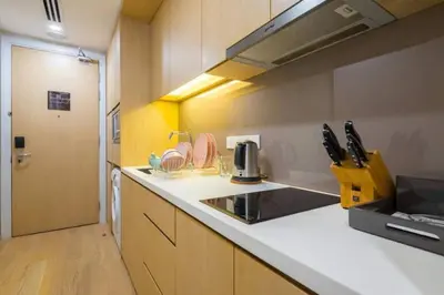 a kitchen with a sink and a counter top at 188 Suites KLCC by Premium Suites in Kuala Lumpur