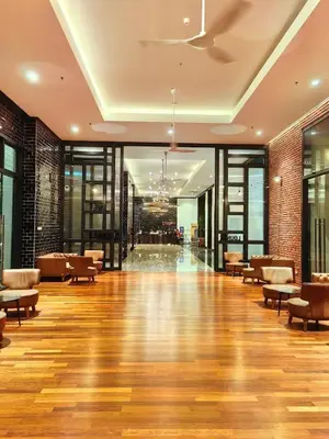 a large lobby with chairs and a hard wood floor at Chambers Residence by Manhattan Group in Kuala Lumpur