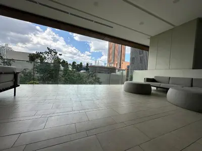 an empty room with a view of a building at Luxurious Home Smart service Lucentia residence in Kuala Lumpur
