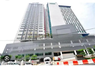 a large building with cars parked in front of it at Cozy home in city center with free parking -1D in Kuala Lumpur