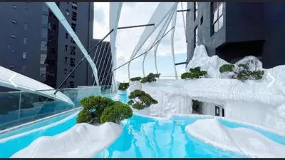 a swimming pool with snow and plants in a building at Arte Mont Kiara By ANQ Suites in Kuala Lumpur