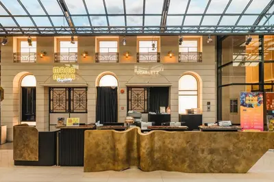a large building with a lobby with a reception desk at Klcc Suites at Twin Tower in Kuala Lumpur
