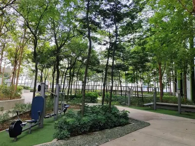 a park with benches and trees on a sidewalk at The Robertson R9 Walk to Jalan Alor Street Bukit Bintang Pavilion 7 pax 2R1B in Kuala Lumpur