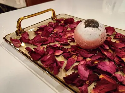 a tray filled with red leaves and an egg on top at 7 Kuala Lumpur City for 4 to 12 PAX of 4 BEDROOMS and 3 BATHROOMS near KLCC in Kuala Lumpur
