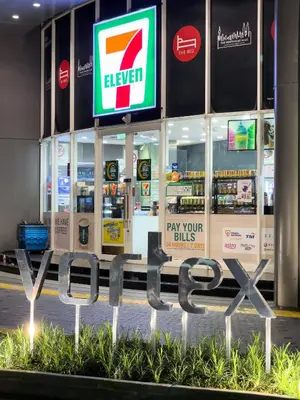 a pay your bills sign in front of a store at Luxury Penthouse KLCC & KL TOWER View in Kuala Lumpur in Kuala Lumpur