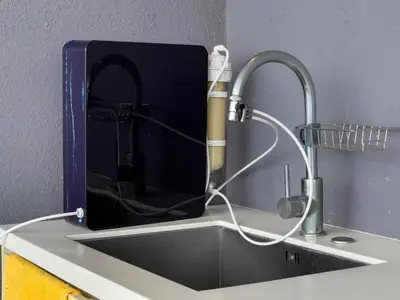 a kitchen sink with a faucet on a counter at Luxury Penthouse KLCC & KL TOWER View in Kuala Lumpur in Kuala Lumpur