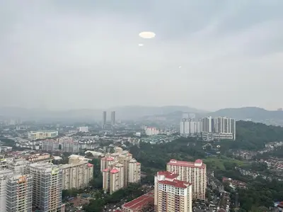 a view of a city with many tall buildings at IndoChina 3BR MVertica near MRT by RumaBnB in Kuala Lumpur
