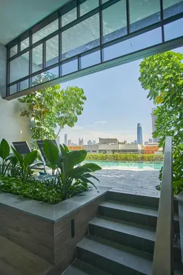 a view from a building with stairs and plants at Trion Residence KL near TRX, MyTown, Ikea Cheras, Pudu in Kuala Lumpur