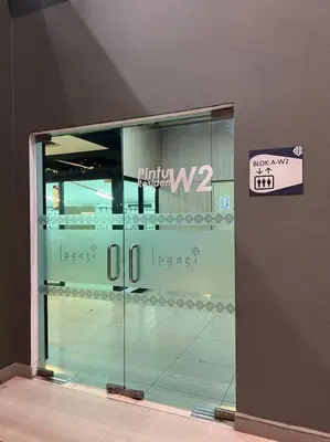 a glass display case with a sign on it at Legasi High floor 3 BR KLCC view in Kuala Lumpur