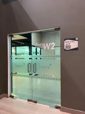 a glass display case with a sign on it at Legasi High floor 3 BR KLCC view in Kuala Lumpur