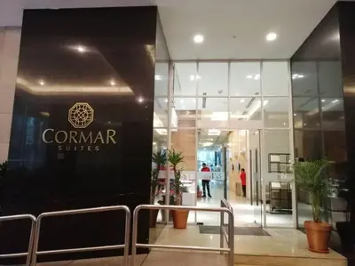 a store front with a sign that reads comar surfaces at Luxzell suit KlCC-7minutes walk to KLCC in Kuala Lumpur