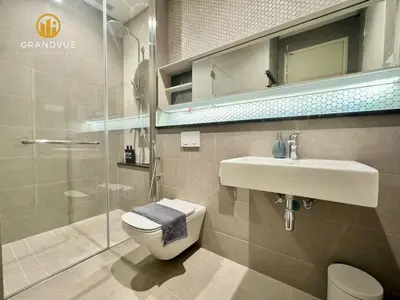 a bathroom with a toilet and a sink and a shower at Lucentia BukitBintang KlccView InfinityPool By HeyStay Management in Kuala Lumpur