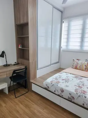 a bedroom with a bed and a desk and a window at Luxury Spacious 4 Bedroom Suite - Cheras Maluri MRT in Kuala Lumpur