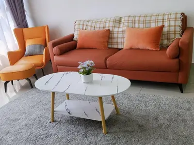 a living room with a couch and a coffee table at Luxury Spacious 4 Bedroom Suite - Cheras Maluri MRT in Kuala Lumpur