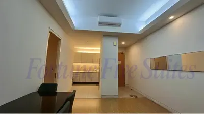a dining room with a skylight in the ceiling at SG Residence Kuala Lumpur by Fortune Suites in Kuala Lumpur