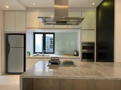 a kitchen with a large counter top in a kitchen at KL PJ Garden Pool Villa Karaoke in Petaling Jaya