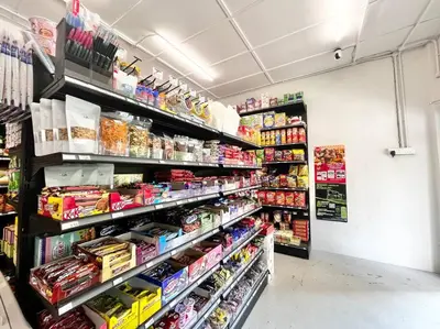 a grocery store aisle with shelves of food and drinks at 3BR at Pantai HillPark near University Malaya Mid Valley in Kuala Lumpur