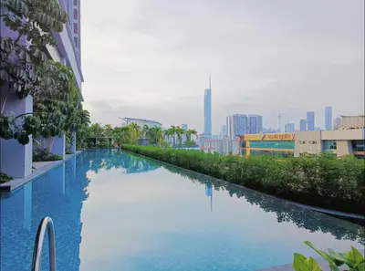 a swimming pool on the side of a building at Trion KL Premium Suite in Kuala Lumpur